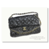Ett canvasprint med en Chanel
